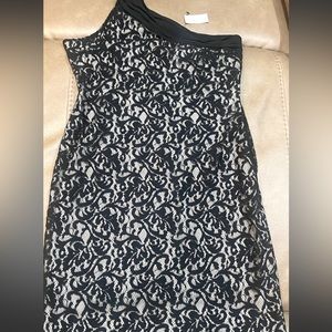 Limited Brand New with tags, lace one shoulder dress size 10. Smoke free home